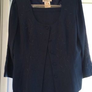 Two piece navy blue suit.